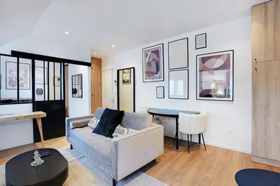 Coin salon dans l'établissement Apartment Cosy - 1BDR-2P - Concorde