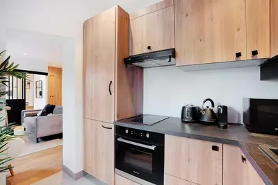 Cuisine ou kitchenette dans l'établissement Apartment Cosy - 1BDR-2P - Concorde