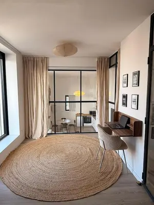 Un ou plusieurs lits dans un hébergement de l'établissement Loft Des Docks by SoHomy - 1 Bed Room - 4 People