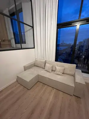 Coin salon dans l'établissement Loft Des Docks by SoHomy - 1 Bed Room - 4 People