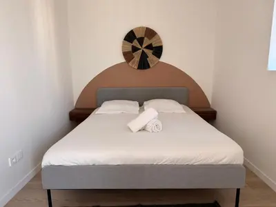 Un ou plusieurs lits dans un hébergement de l'établissement Loft Des Docks by SoHomy - 1 Bed Room - 4 People