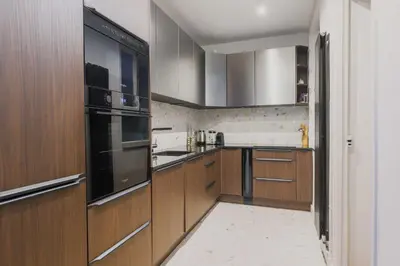 Cuisine ou kitchenette dans l'établissement Modern a-c Apartment 4BR-8P - Arc de Triomphe