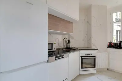 Cuisine ou kitchenette dans l'établissement Elegant apartment - 2BR-4P - Pantheon