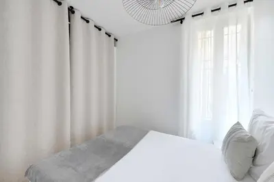 Un ou plusieurs lits dans un hébergement de l'établissement Bright Apartment 1BR-2P - Parc de la Villette
