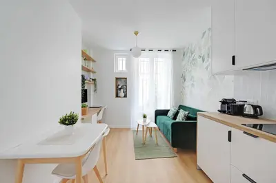 Cuisine ou kitchenette dans l'établissement Bright Apartment 1BR-2P - Parc de la Villette