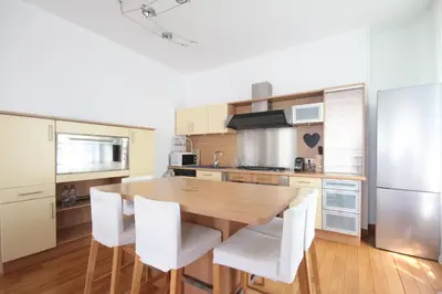Cuisine ou kitchenette dans l'établissement Spacieux 4 Pièces Parc des Princes Roland-Garros