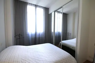 Un ou plusieurs lits dans un hébergement de l'établissement Spacieux 4 Pièces Parc des Princes Roland-Garros