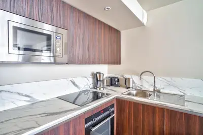 Cuisine ou kitchenette dans l'établissement UrbanFlat 131 - Amazing apartment in the center of Paris