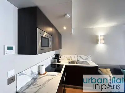 Cuisine ou kitchenette dans l'établissement UrbanFlat 131 - Amazing apartment in the center of Paris