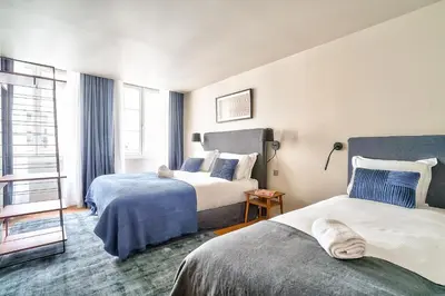 Un ou plusieurs lits dans un hébergement de l'établissement UrbanFlat 131 - Amazing apartment in the center of Paris