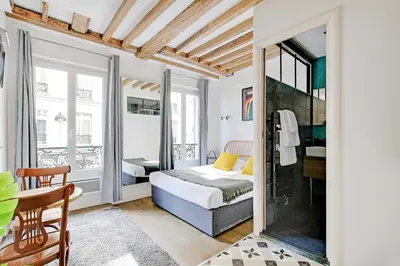 Un ou plusieurs lits dans un hébergement de l'établissement Charming studio - 2P - Montmartre