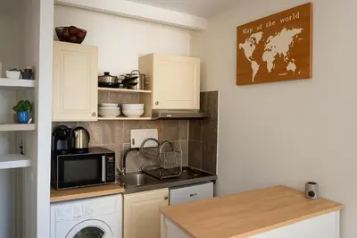 Cuisine ou kitchenette dans l'établissement Etoile de montmartre