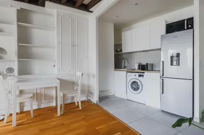 Cuisine ou kitchenette dans l'établissement Charming Apartment 1BR-2P-Paris 7th-Bon Marche