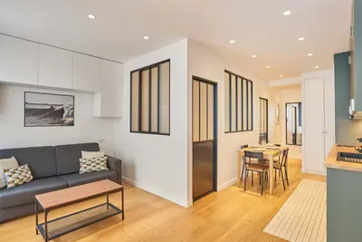 Coin salon dans l'établissement Charming Apartment-Bastille-Le Marais