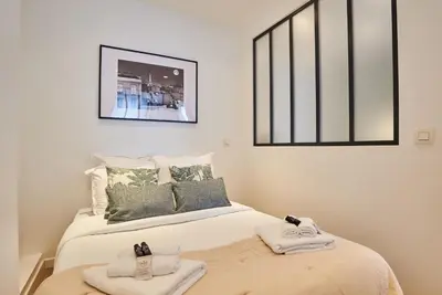 Un ou plusieurs lits dans un hébergement de l'établissement Charming Apartment-Bastille-Le Marais
