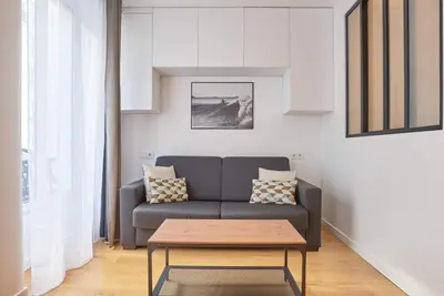 Coin salon dans l'établissement Charming Apartment-Bastille-Le Marais
