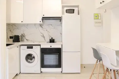 Cuisine ou kitchenette dans l'établissement Modern apartment at the gates of Paris