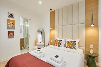 Un ou plusieurs lits dans un hébergement de l'établissement Luxury Suite in the Center of Paris