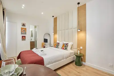 Un ou plusieurs lits dans un hébergement de l'établissement Luxury Suite in the Center of Paris