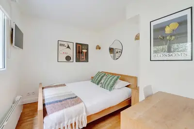 Un ou plusieurs lits dans un hébergement de l'établissement Apt Cosy - AC-1CH-4P - Suresnes-Parc du Chateau