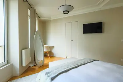 Un ou plusieurs lits dans un hébergement de l'établissement Elegant Appt - 2BDR-4P - Bastille - Marais