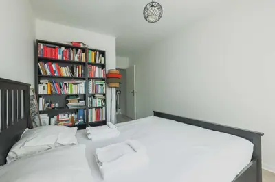 Un ou plusieurs lits dans un hébergement de l'établissement Charming apartment - 1BR- 4P- Passy