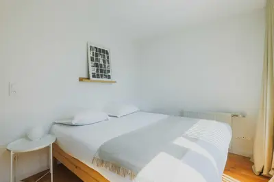 Un ou plusieurs lits dans un hébergement de l'établissement Magnificent apartment -2BR-6P- Belleville