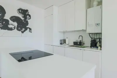 Cuisine ou kitchenette dans l'établissement Magnificent apartment -2BR-6P- Belleville