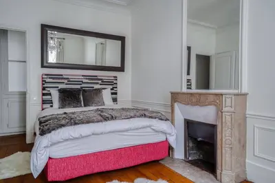 Un ou plusieurs lits dans un hébergement de l'établissement 213 m2 Prestige Eiffel Signature
