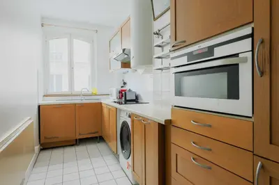 Cuisine ou kitchenette dans l'établissement Cosy Apartment - 1BR-2P- Le Marais