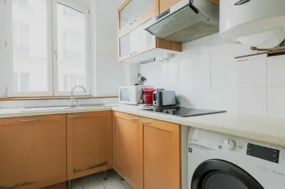 Cuisine ou kitchenette dans l'établissement Cosy Apartment - 1BR-2P- Le Marais