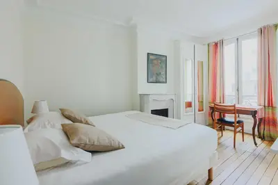 Un ou plusieurs lits dans un hébergement de l'établissement Cosy Apartment - 1BR-2P- Le Marais