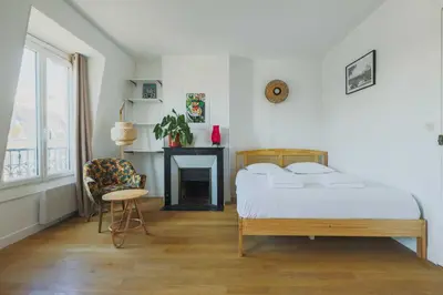 Un ou plusieurs lits dans un hébergement de l'établissement Charming 2P studio - 14th-Montparnasse