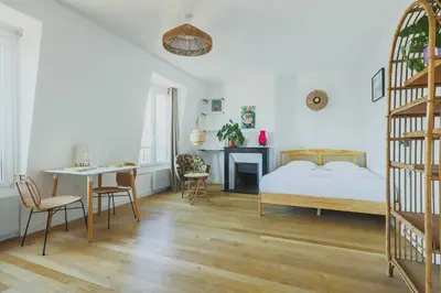 Un ou plusieurs lits dans un hébergement de l'établissement Charming 2P studio - 14th-Montparnasse