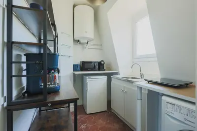 Cuisine ou kitchenette dans l'établissement Charming 2P studio - 14th-Montparnasse