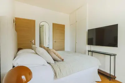 Un ou plusieurs lits dans un hébergement de l'établissement Modern flat -1BR-4P- Paris 17e