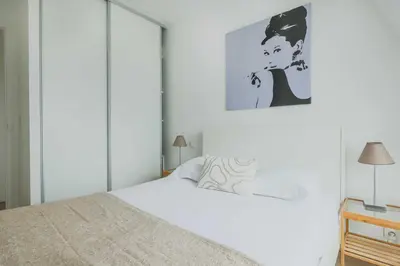 Un ou plusieurs lits dans un hébergement de l'établissement Bright apartment - 1BR-2P - Le Marais