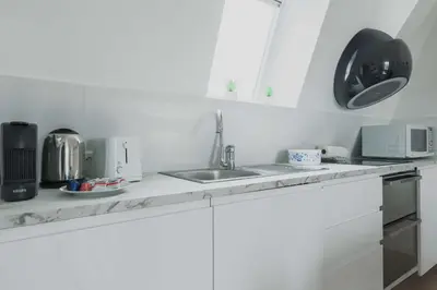 Cuisine ou kitchenette dans l'établissement Bright apartment - 1BR-2P - Le Marais