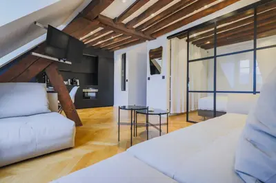 Coin salon dans l'établissement Modern flat -1BR-2P- in the heart of the Marais