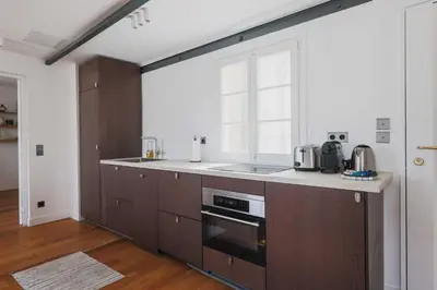 Cuisine ou kitchenette dans l'établissement Modern Apartment -2BR-4P- Marais