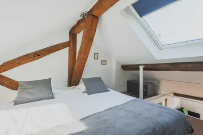 Un ou plusieurs lits dans un hébergement de l'établissement Central flat - 2BDR-4P - Ile stlouis Paris
