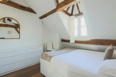 Un ou plusieurs lits dans un hébergement de l'établissement Central flat - 2BDR-4P - Ile stlouis Paris