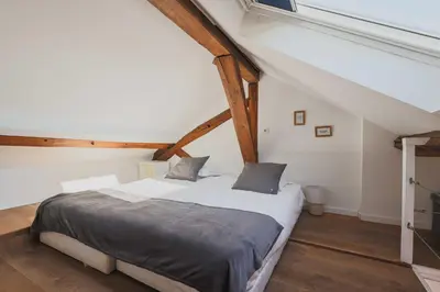 Un ou plusieurs lits dans un hébergement de l'établissement Central flat - 2BDR-4P - Ile stlouis Paris