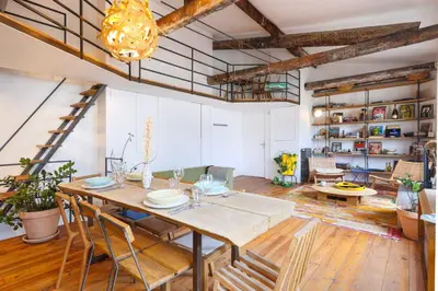 Coin salon dans l'établissement Charming Duplex - 2BD-5P - Nation