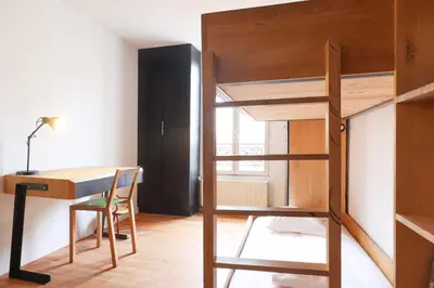 Un ou plusieurs lits dans un hébergement de l'établissement Charming Duplex - 2BD-5P - Nation