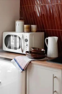 Cuisine ou kitchenette dans l'établissement la suite rouge du marais
