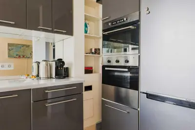 Cuisine ou kitchenette dans l'établissement Modern apartment -1BR-3P- Trocadero