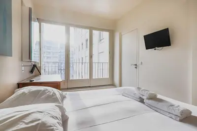 Un ou plusieurs lits dans un hébergement de l'établissement Modern apartment -1BR-3P- Trocadero