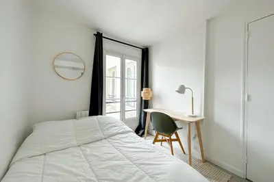 Un ou plusieurs lits dans un hébergement de l'établissement Charming 14m studio in Paris 17th arrondissement
