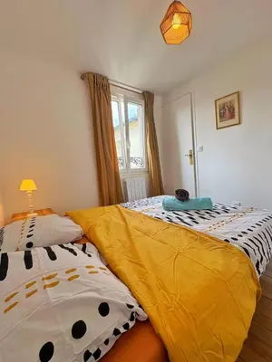 Un ou plusieurs lits dans un hébergement de l'établissement Charming 1 bedroom apartment- City center of Paris